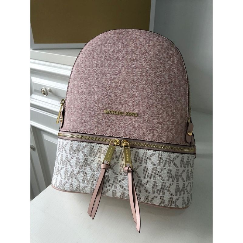 Pink and white shop michael kors backpack