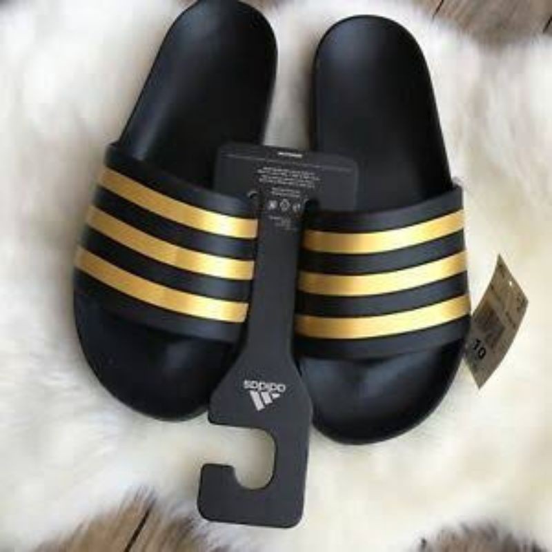 Black best sale gold slides