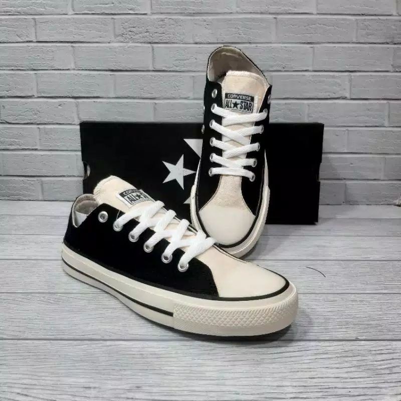 Cream and shop black converse