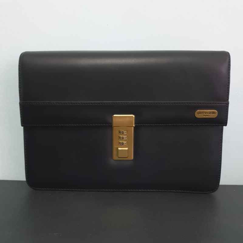 Pierre cardin hot sale clutch bag