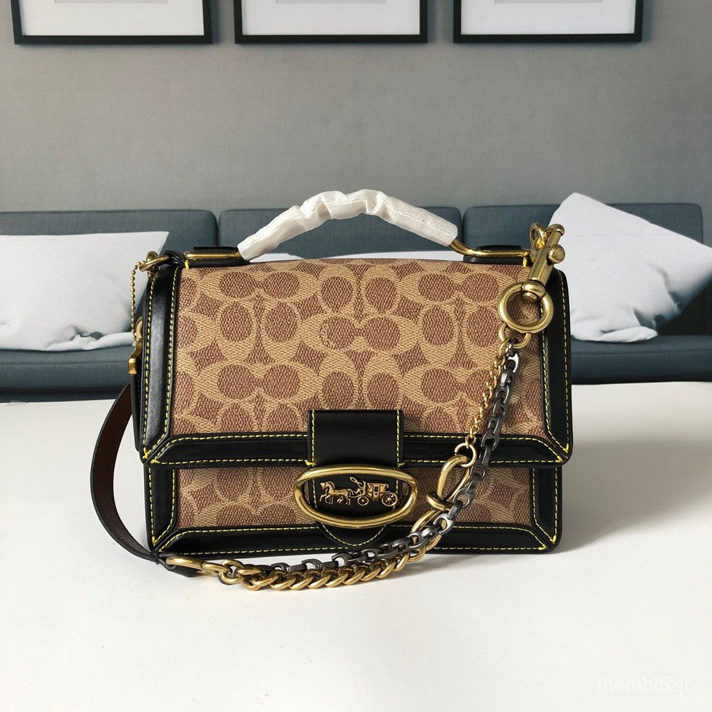 100Coach Riley Top Handle 22 In Signature Coated Canvas Women