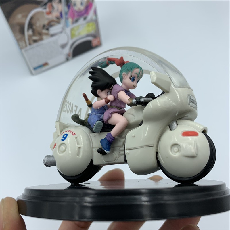 Super beautiful genuine bulma model riding a motorbike with goku ...