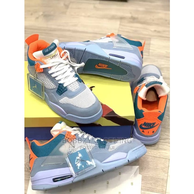 Light blue clearance and orange jordans