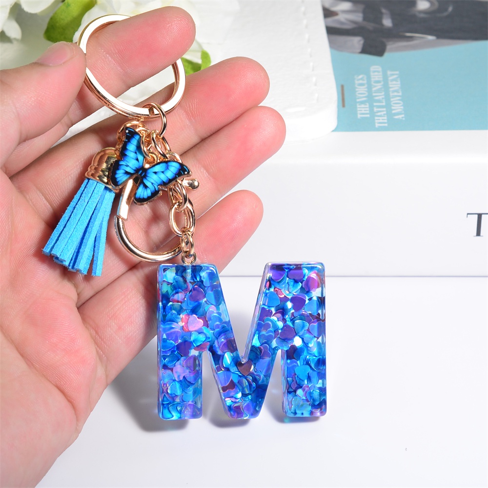 Initial keychain with tassel shop
