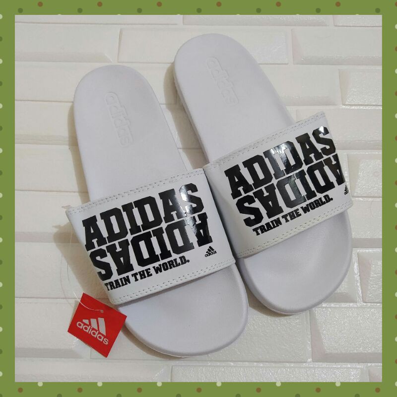 Adidas train the world slides on sale