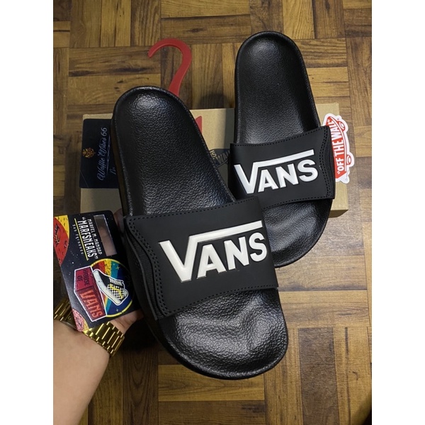 Vans black online slides