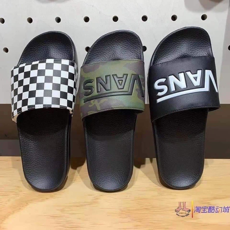 Vans slippers online black