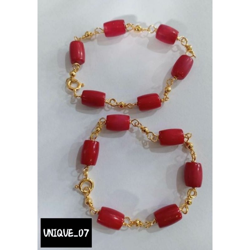 Coral bracelet for babies on sale meaning