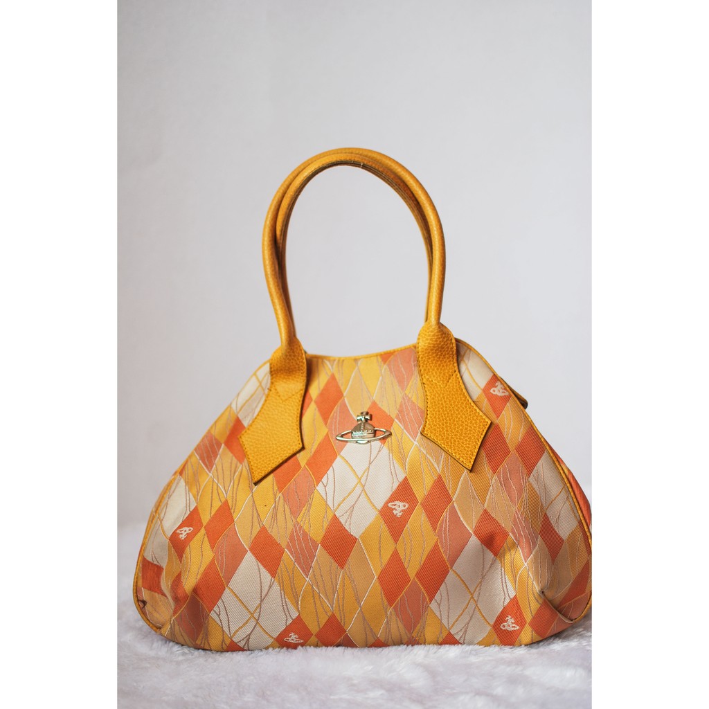 Yellow vivienne westwood bag hot sale