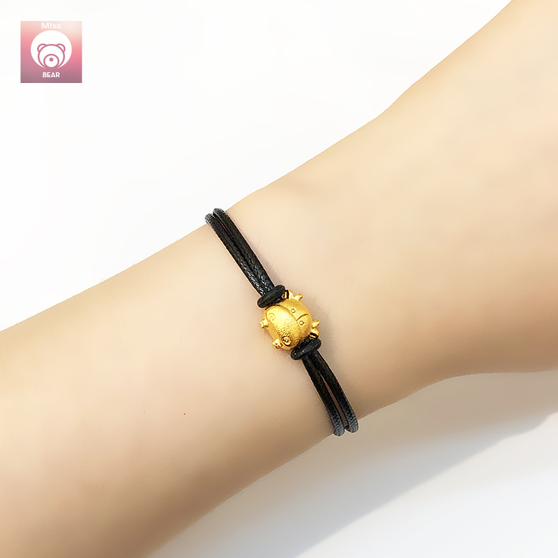 Lucky charm store gold bracelet