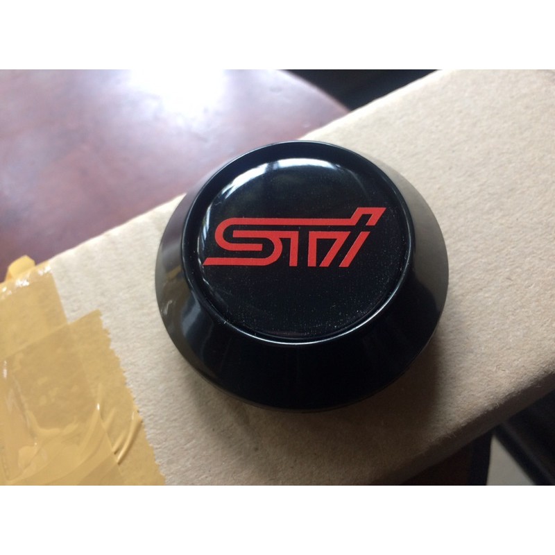 Sti deals wheel caps