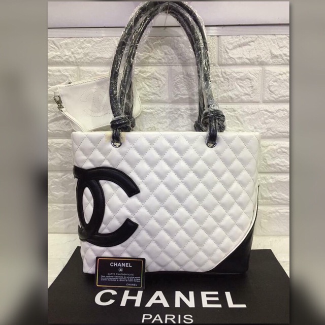 Chanel black and hot sale white handbag