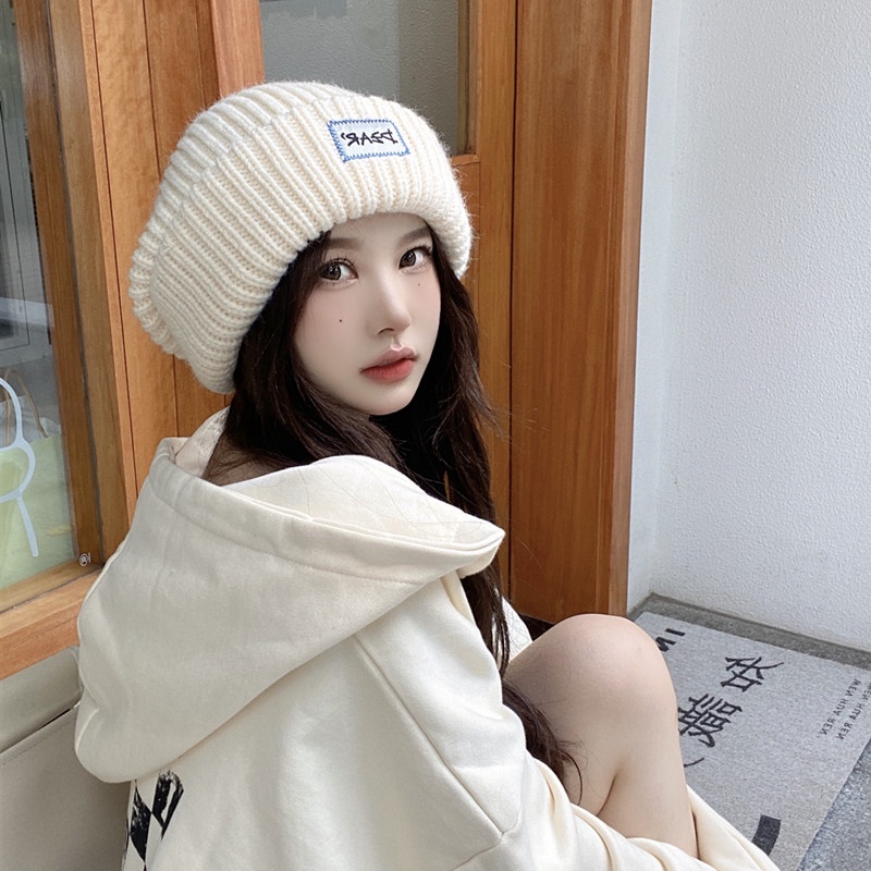 Round woolen hot sale cap