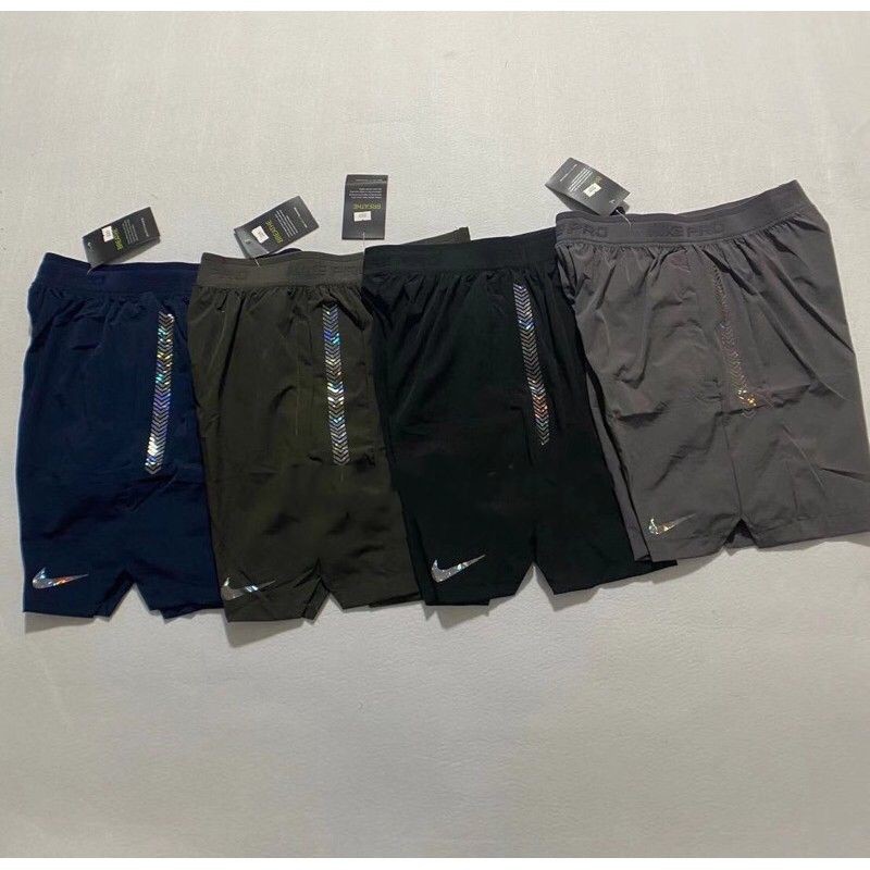 Nike dri fit shorts with sales zip pockets