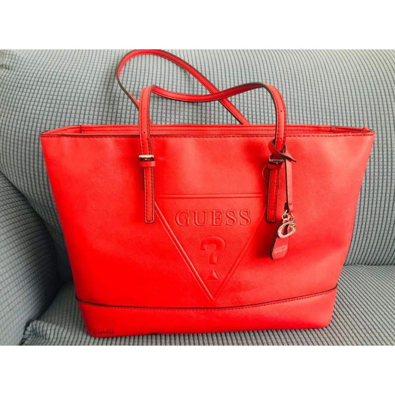 Red Guess tote bag with charm