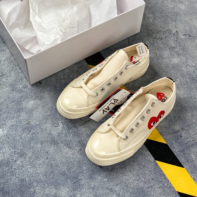 Beige cdg hot sale converse