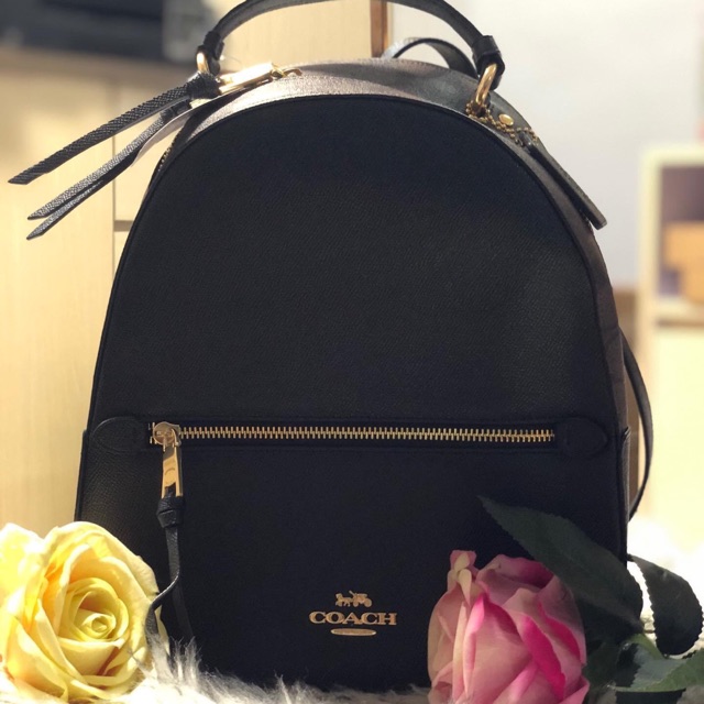 Coach jordyn backpack best sale with signature canvas detail