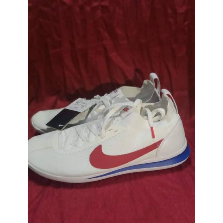 Nike white shoes with red hot sale and blue