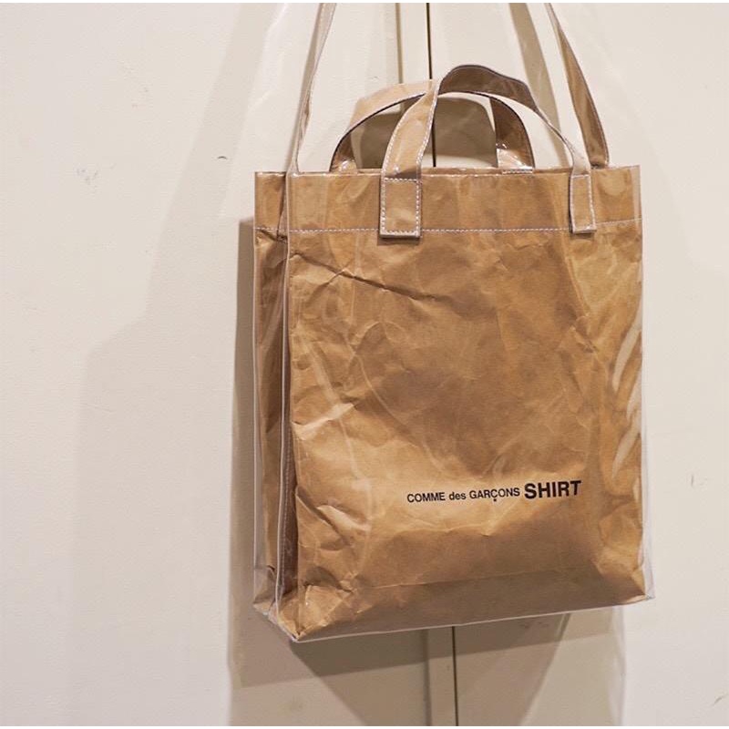 Comme des garçons shirt kraft paper pvc messenger tote hotsell