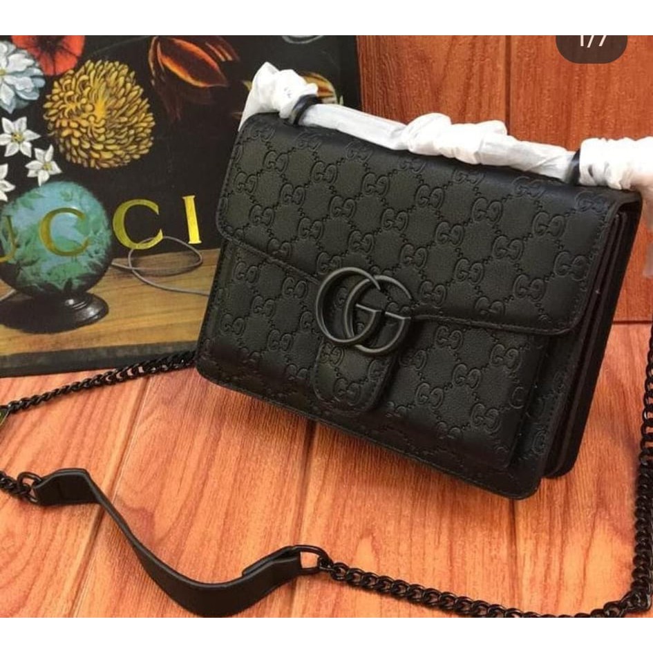 Gucci black store sling bag