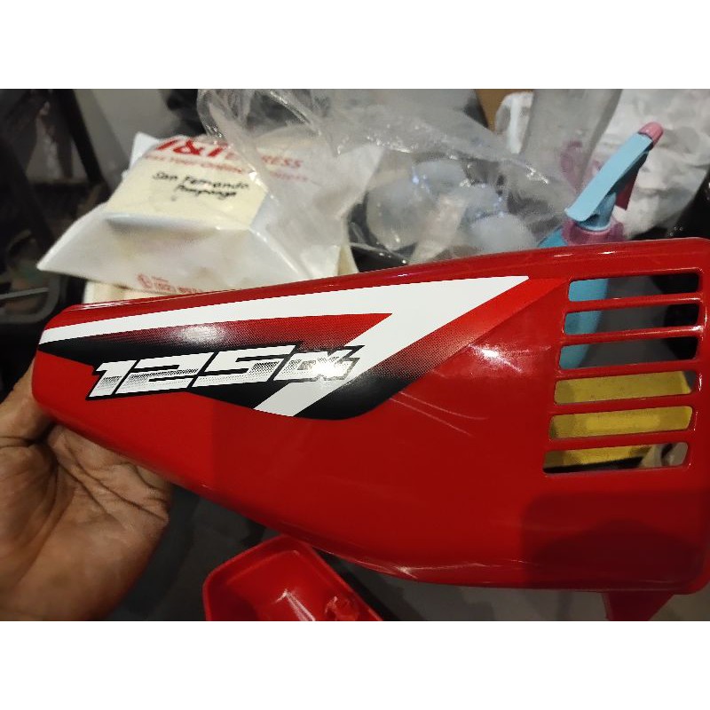 Tmx 125 on sale side cover