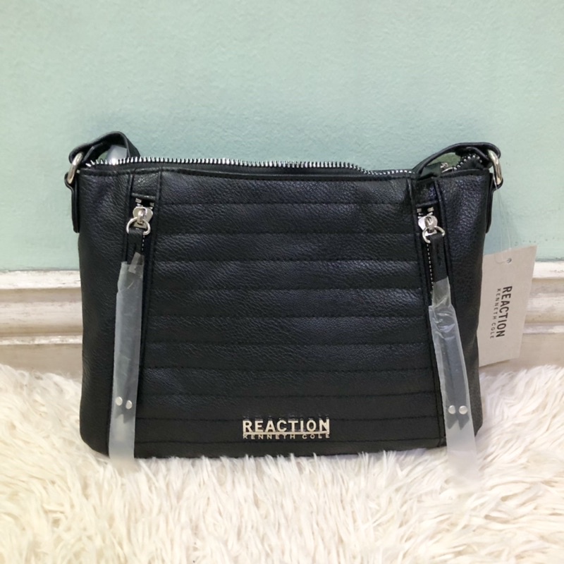 Kenneth cole reaction sling 2024 bag