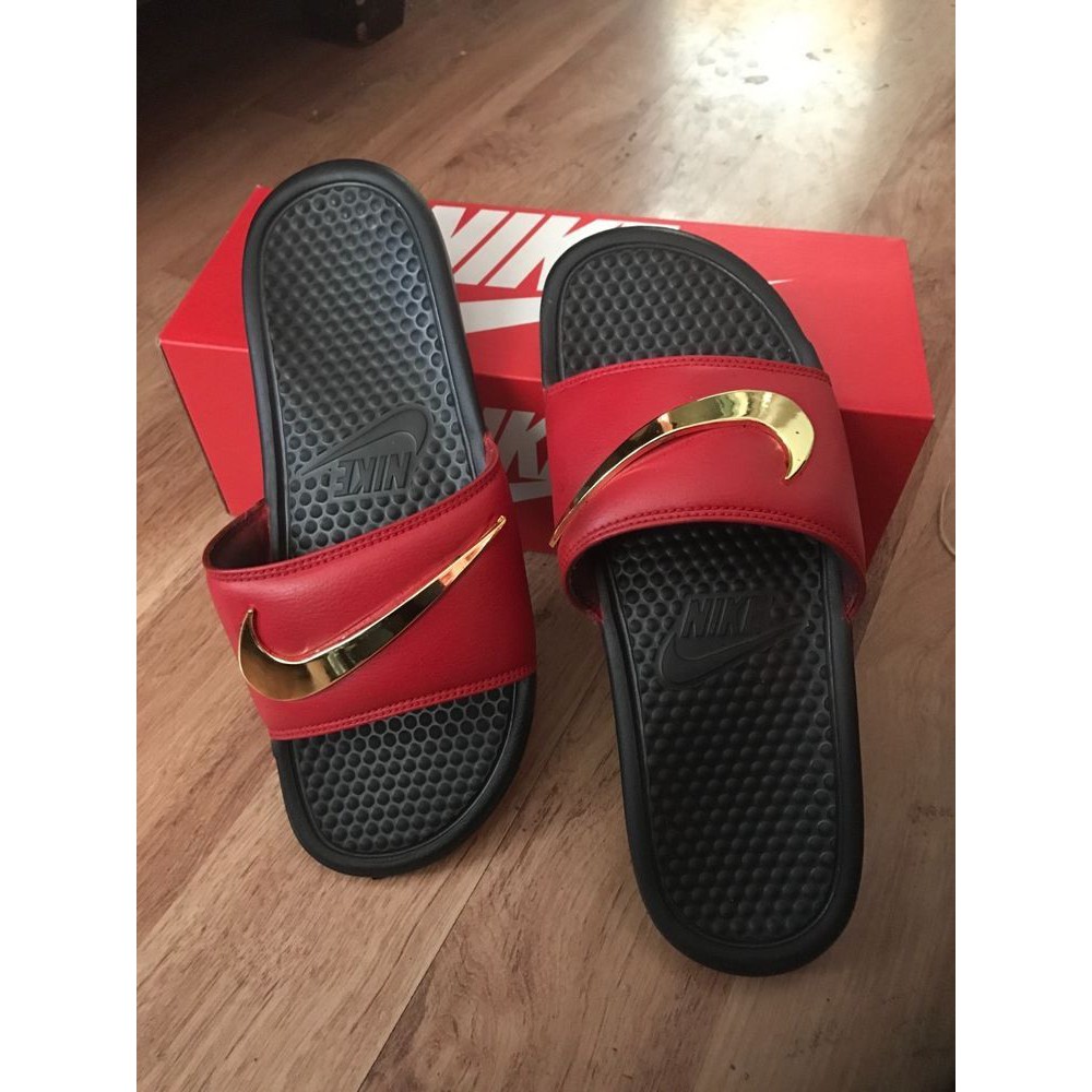 Nike sandals with store gold check