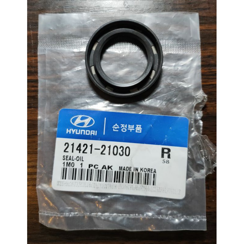 2142121030-front-crankshaft-oil-seal-original-for-hyundai-getz-i20