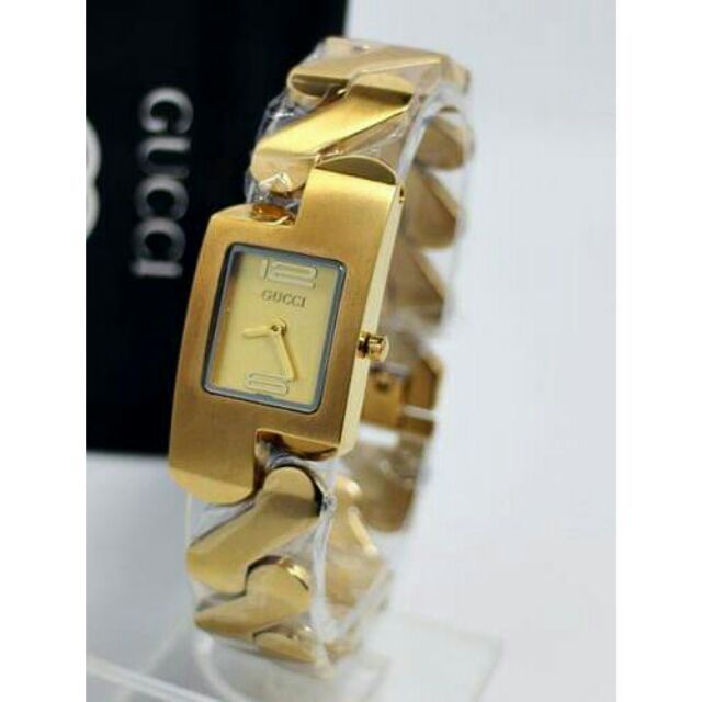 Gucci zig zag 2025 gold watch price