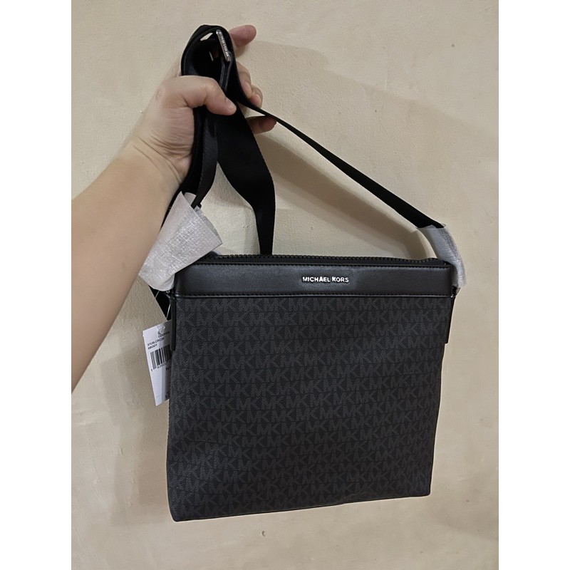 Michael kors sling 2025 bag men