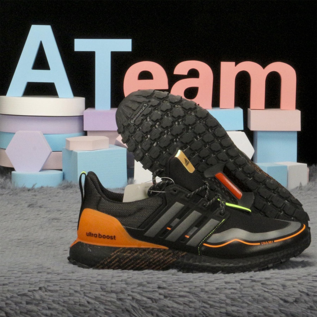 Adidas black shop and orange shoes