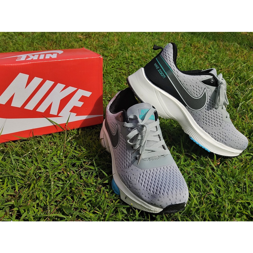 Gray nike store running shoes