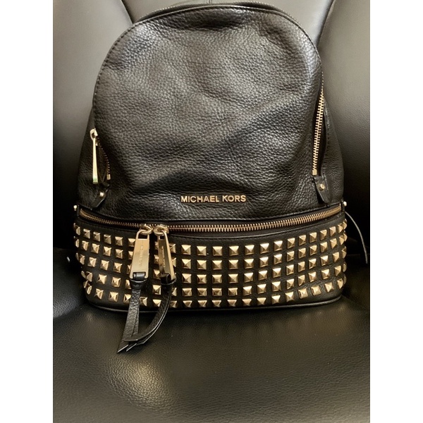 Mk backpack with outlet studs