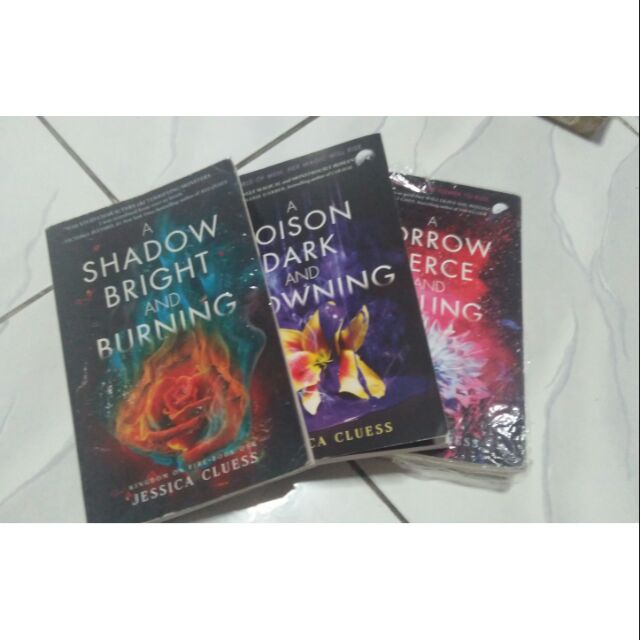 A Shadow Bright and Burning,A Poison Dark and Drowning,A Sorrow Fierce