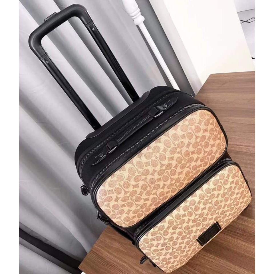 Coach luggage cheap with wheels