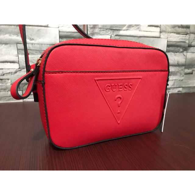 Guess red store sling bag