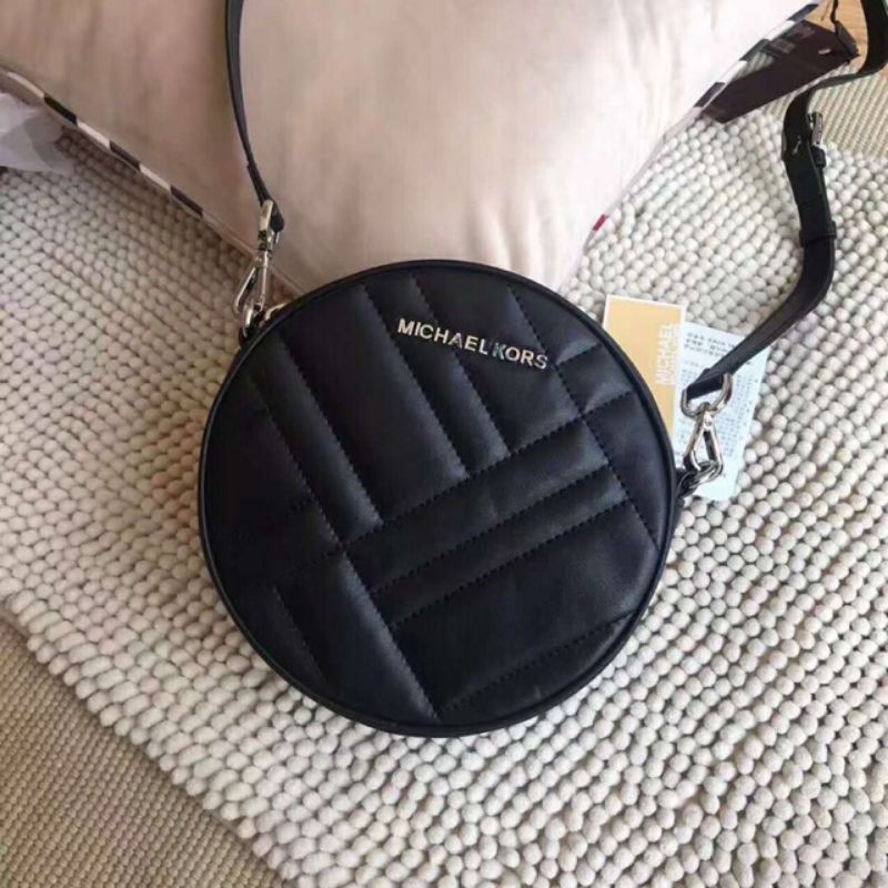 Mk round deals sling bag