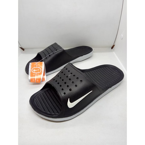 Nike slides with holes on sale