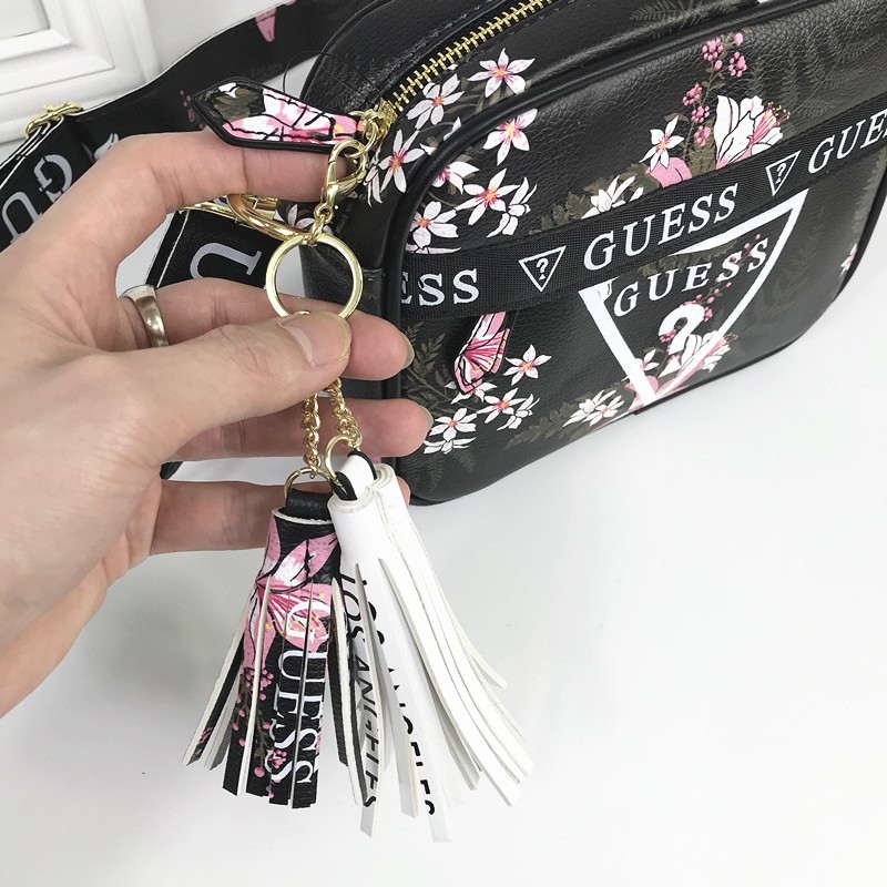 Guess floral sling bag on sale