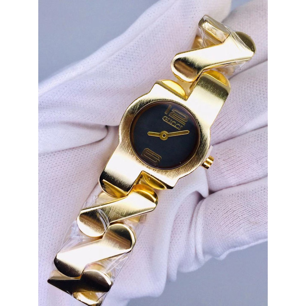 Gucci zig zag shop gold watch price