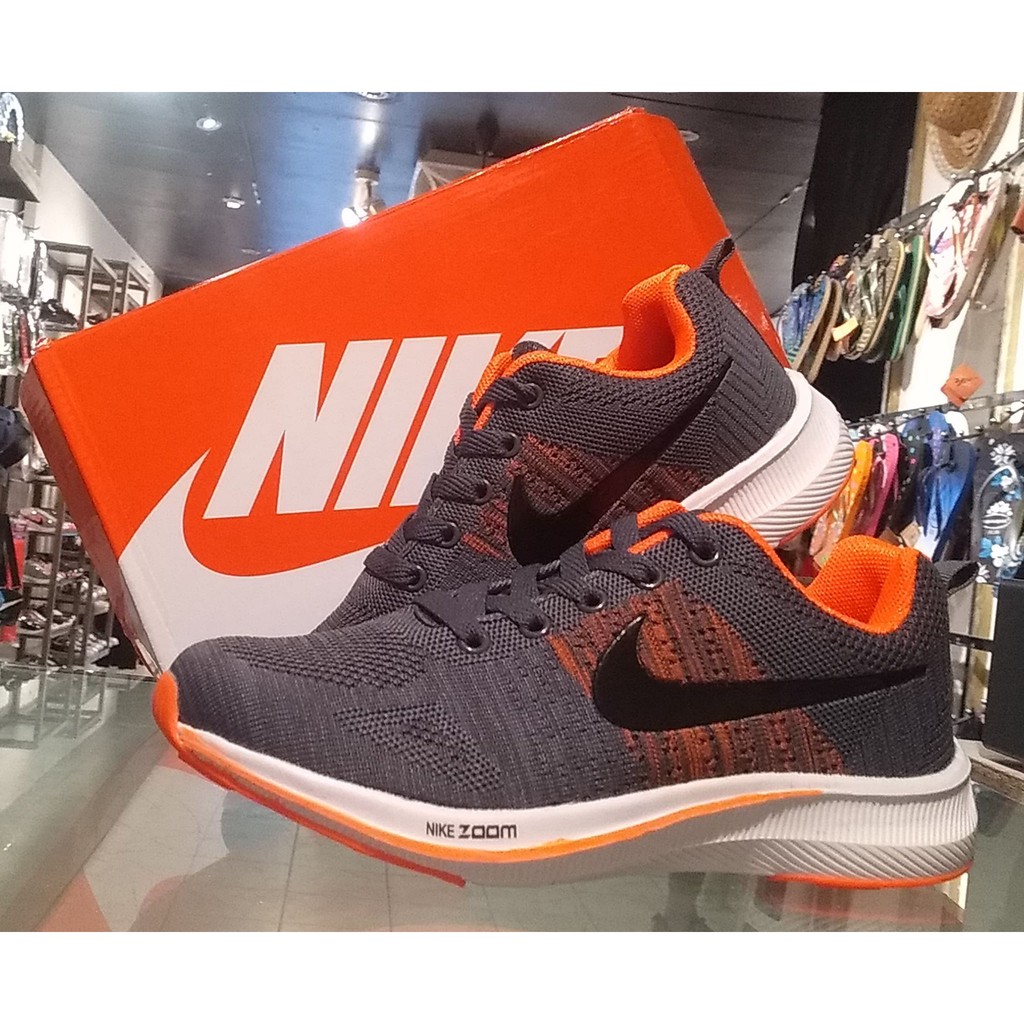 Nike free grey clearance orange