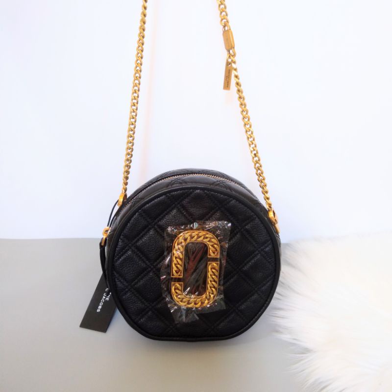 Marc jacobs round online crossbody bag