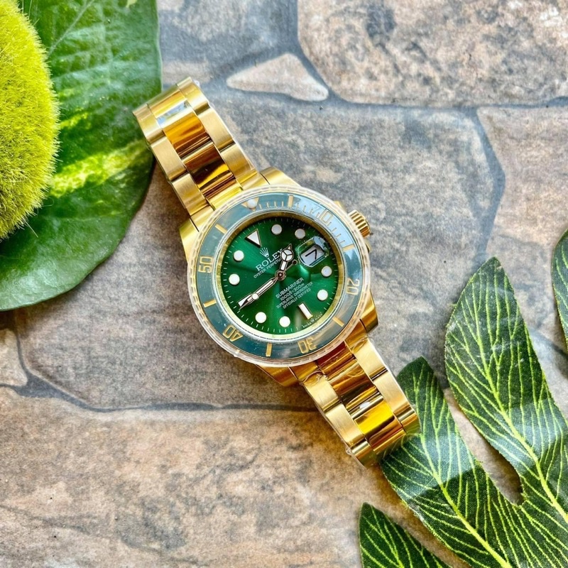 Gold green submariner sale