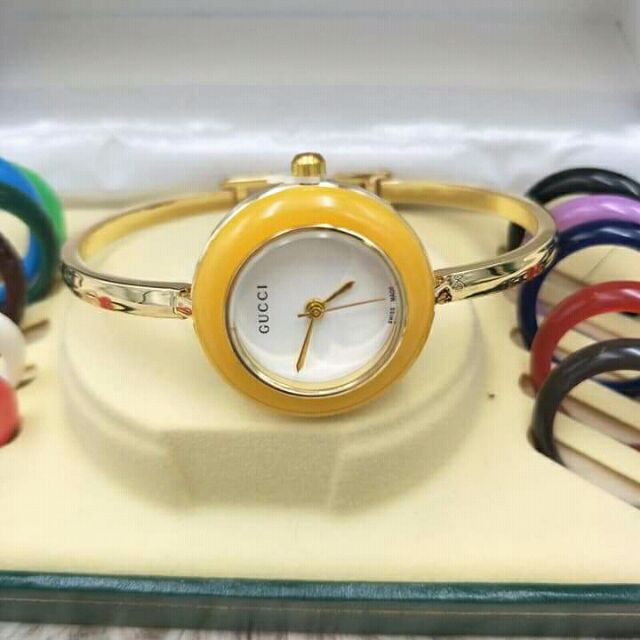 Gucci watch with outlet colored rings price