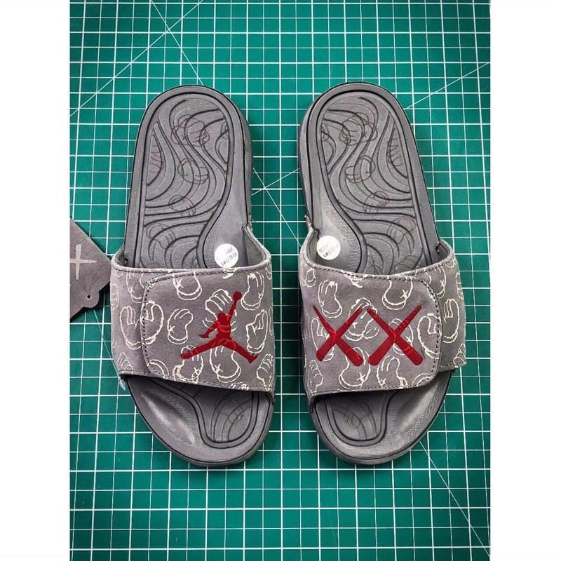 Kaws hot sale jordan slides