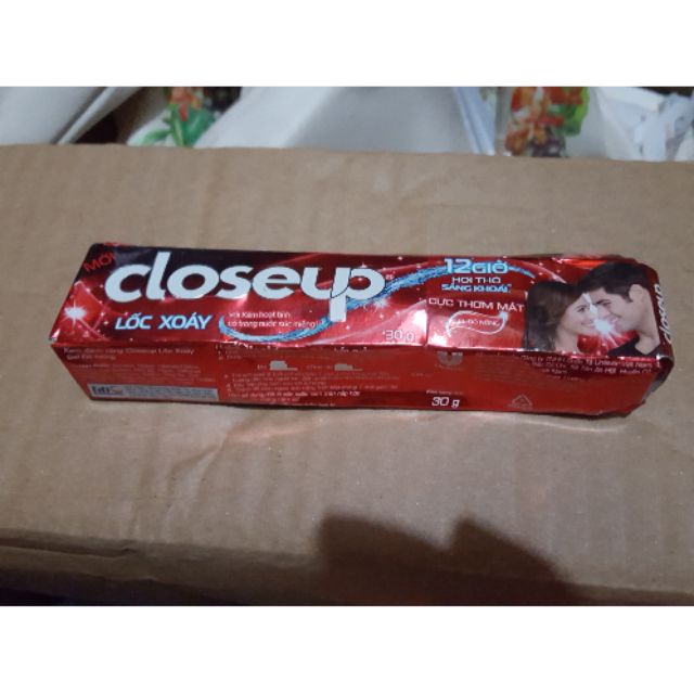 Red closeup toothpaste 30g with dented shell expiry date July, August ...