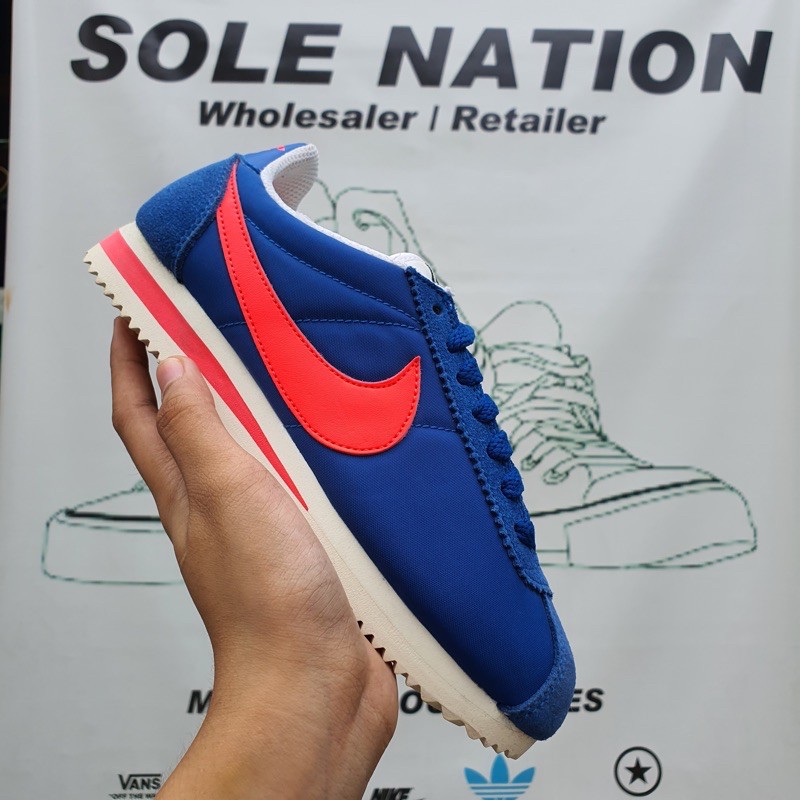 Nike cortez blue store pink