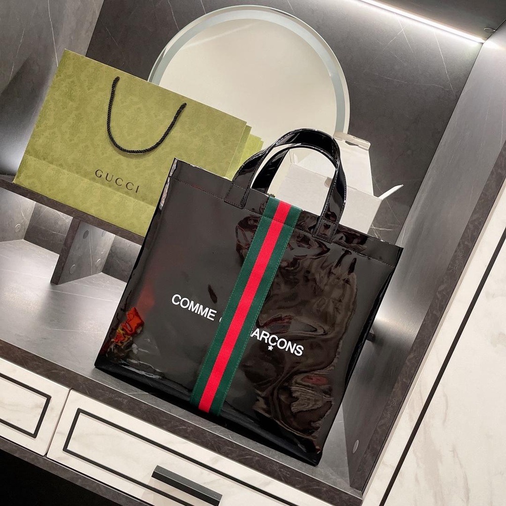 Cdg discount gucci bag