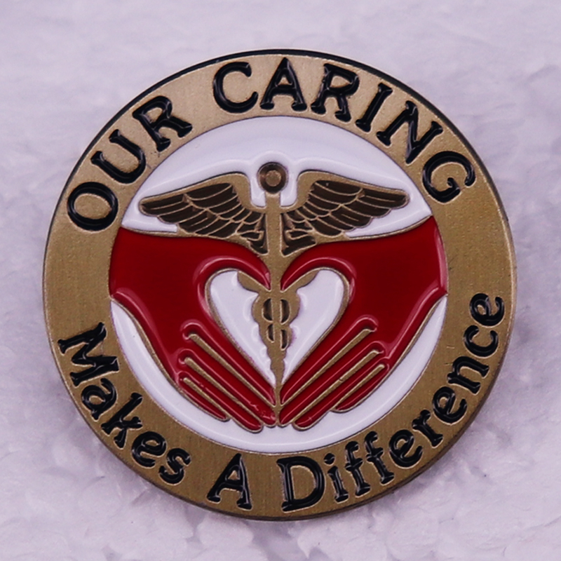 Our caring make a difference brooch Vintage metal badge Caduceus logo
