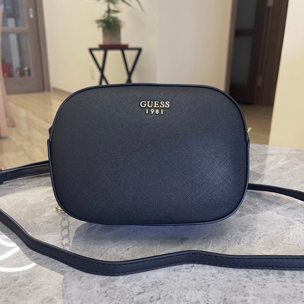 Guess Women's Mini Sling Bag（ can fit 14 pro max）501001